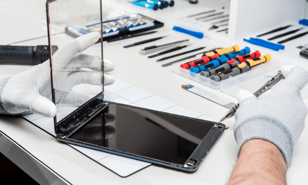 Close-up photos showing process of tablet device repair